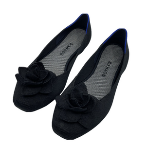 Rothy’s‎ black flats. Gorgeous.